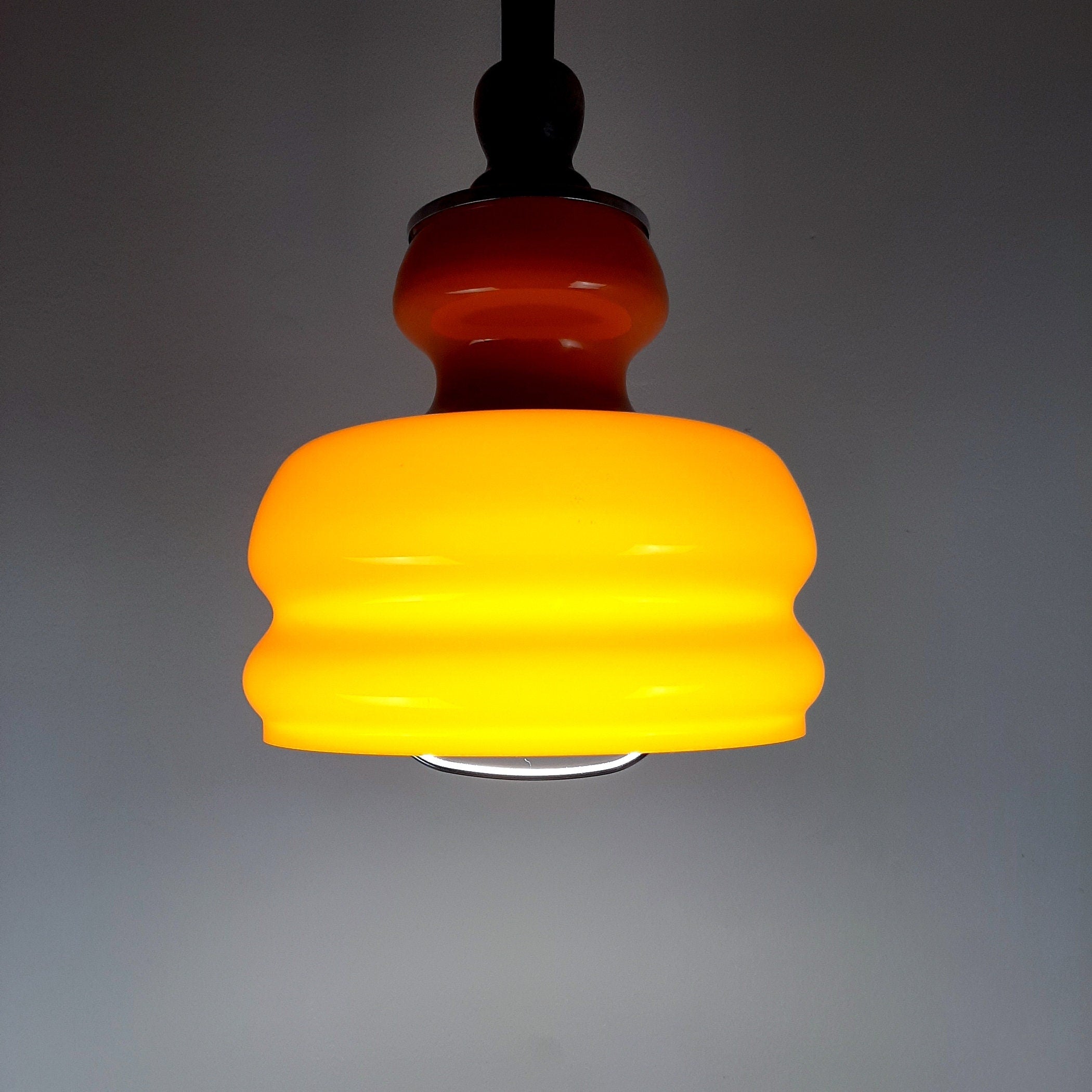 Mid-century orange glass pendant lamp Yugoslavia 1970s Retro lighting Space age