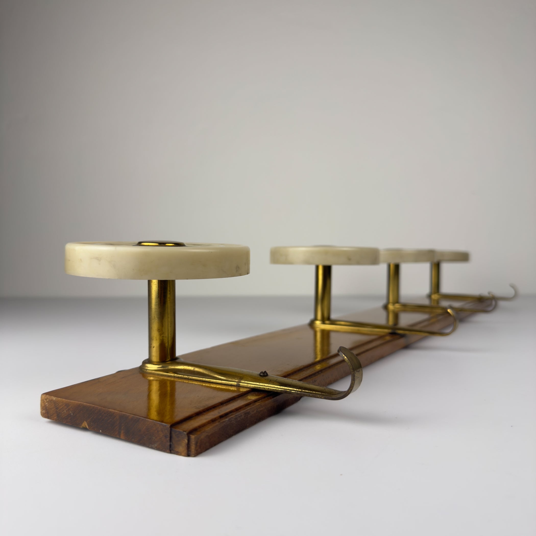 Vintage Art Deco brass & bakelite hanger, Italy 1950s