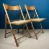 Pair of folding chairs with rattan seat Italy 1980s Mid-century wooden furniture